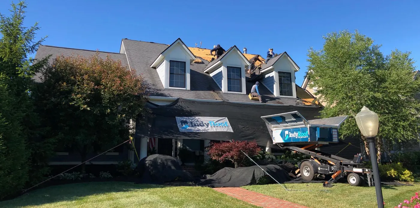 Tarping and dry-in on a Britton Falls commercial roof